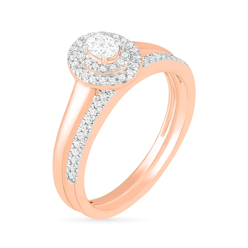 0.37 CT. T.W. Oval Diamond Double Frame Bridal Set in 10K Rose Gold