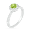 Thumbnail Image 1 of 5.2mm Peridot and White Lab-Created Sapphire Frame Tapered Shank Flower Ring in Sterling Silver