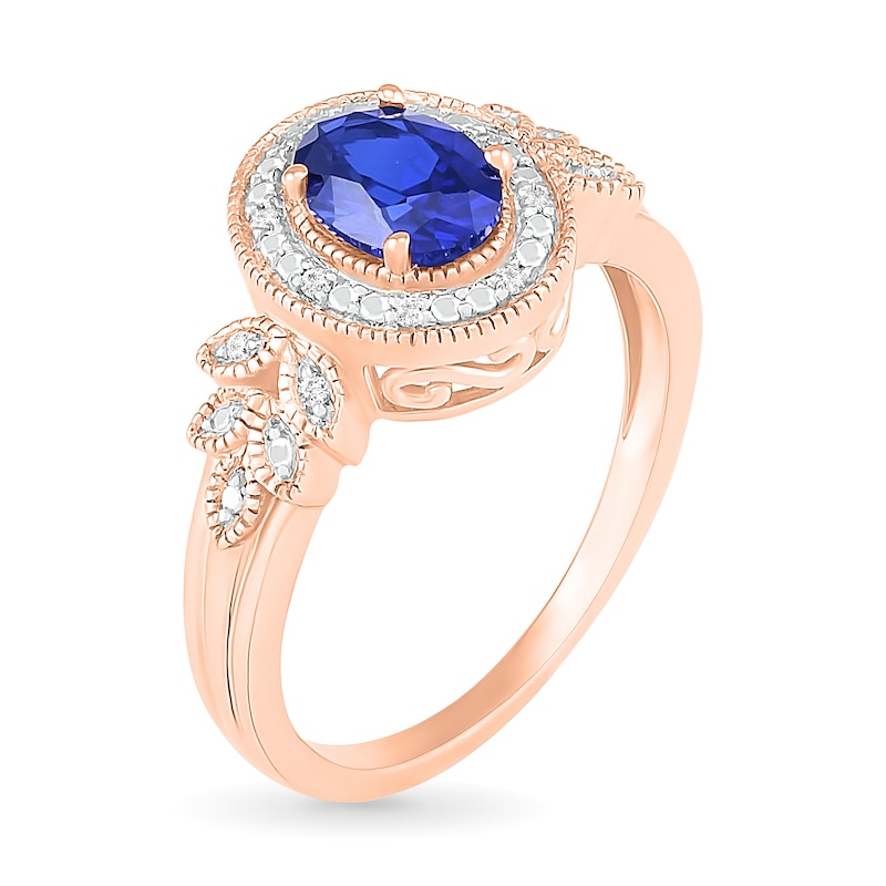Oval Blue Lab-Created Sapphire and 0.04 CT. T.W. Diamond Frame Leaf-Sides Triple Row Vintage-Style Ring in 10K Rose Gold