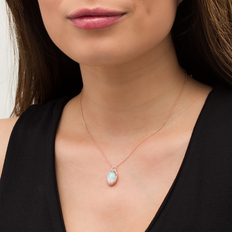 EFFY™ Collection Oval Opal and 0.17 CT. T.W. Diamond Frame Interlocking Drop Pendant in 14K Rose Gold