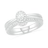 0.29 CT. T.W. Oval Diamond Frame Bridal Set in 10K White Gold