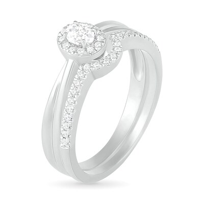 0.29 CT. T.W. Oval Diamond Frame Bridal Set in 10K White Gold
