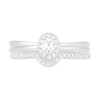 0.29 CT. T.W. Oval Diamond Frame Bridal Set in 10K White Gold
