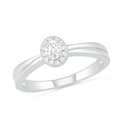 0.29 CT. T.W. Oval Diamond Frame Bridal Set in 10K White Gold