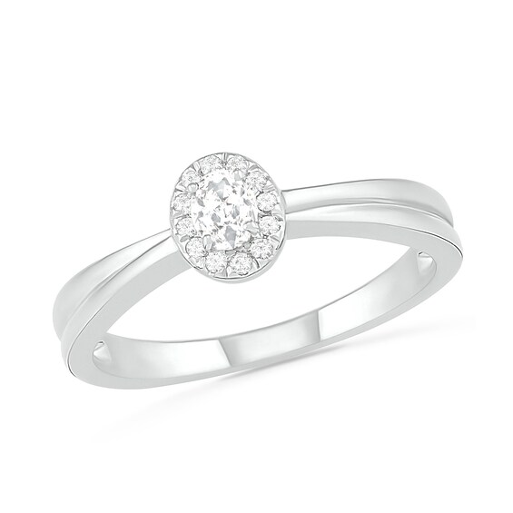 0.29 CT. T.W. Oval Diamond Frame Bridal Set in 10K White Gold
