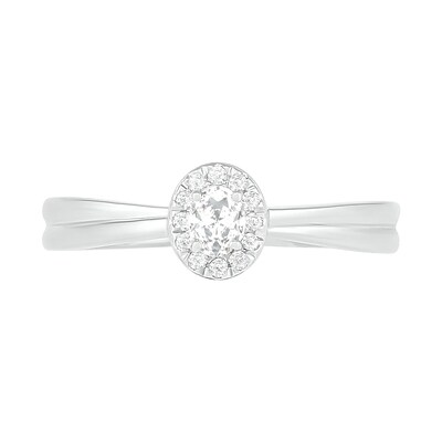 0.29 CT. T.W. Oval Diamond Frame Bridal Set in 10K White Gold