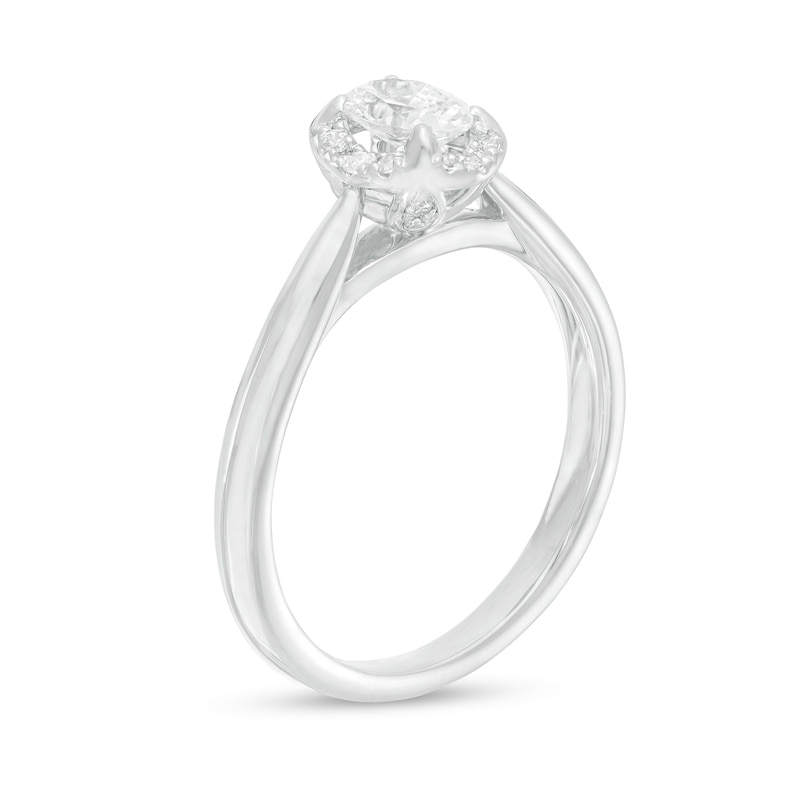 Main Image 2 of 0.62 CT. T.W. Oval Diamond Frame Engagement Ring in 14K White Gold (I/I2)