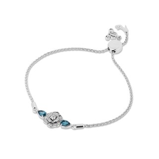 Enchanted Disney Cinderella Pear-Shaped London Blue Topaz and 0.085 CT. T.W. Diamond Bolo Bracelet in Sterling Silver - 9"