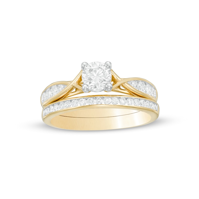 Main Image 1 of 0.95 CT. T.W. Diamond Crossover Bridal Set in 14K Gold