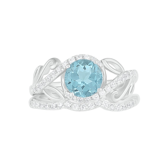 7.0mm Aquamarine and 0.37 CT. T.W. Diamond Bypass Leaf Shank Bridal Set in 10K White Gold