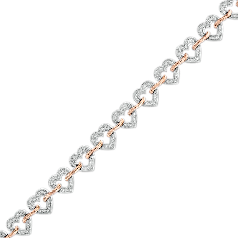 0.10 CT. T.W. Diamond Hearts Bracelet in Sterling Silver and 10K Rose Gold - 7.5"