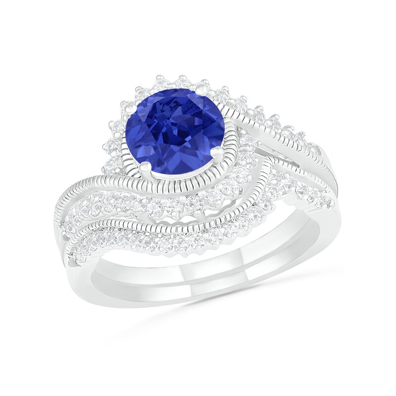 Main Image 1 of 7.0mm Lab-Created Blue and White Sapphire Sunburst Bypass Frame Vintage-Style Bridal Set in Sterling Silver