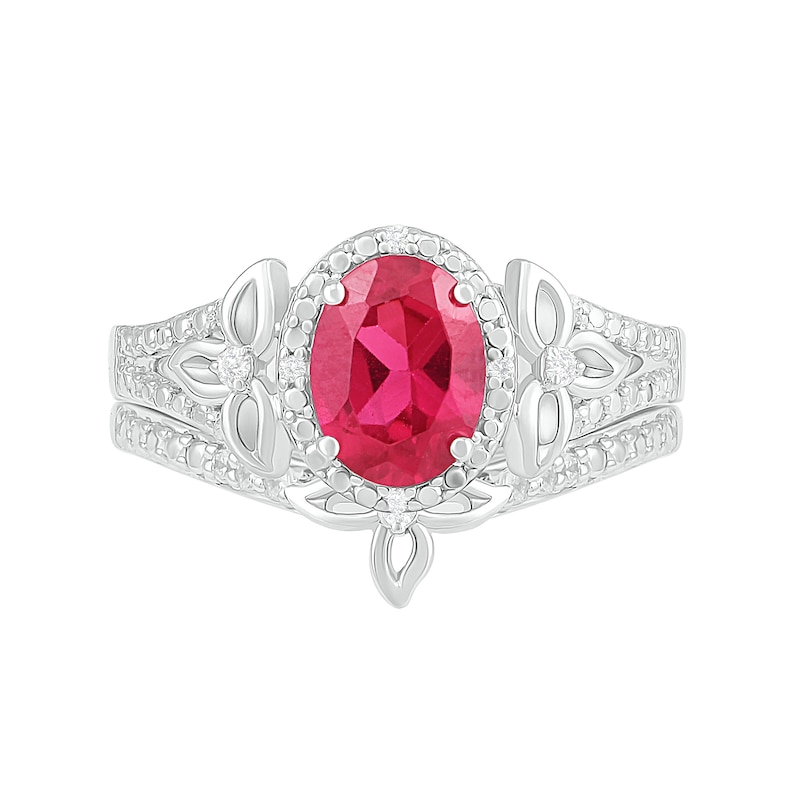 Oval Lab-Created Ruby and 0.065 CT. T.W. Diamond Bead Frame Flower-Sides Split Shank Bridal Set in Sterling Silver