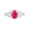 Oval Lab-Created Ruby and 0.065 CT. T.W. Diamond Bead Frame Flower-Sides Split Shank Bridal Set in Sterling Silver