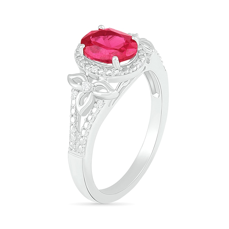 Oval Lab-Created Ruby and 0.065 CT. T.W. Diamond Bead Frame Flower-Sides Split Shank Bridal Set in Sterling Silver