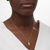 Thumbnail Image 2 of 0.15 CT. T.W. Composite Diamond Interlocking Flames Pendant in 10K Gold