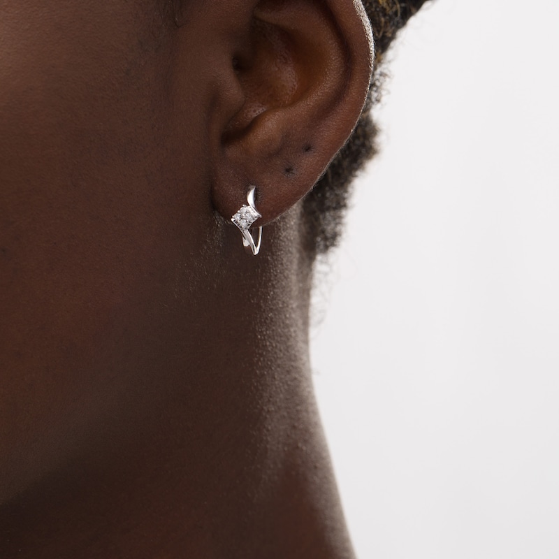0.10 CT. T.W. Quad Diamond Bypass Huggie Hoop Earrings in 10K White Gold