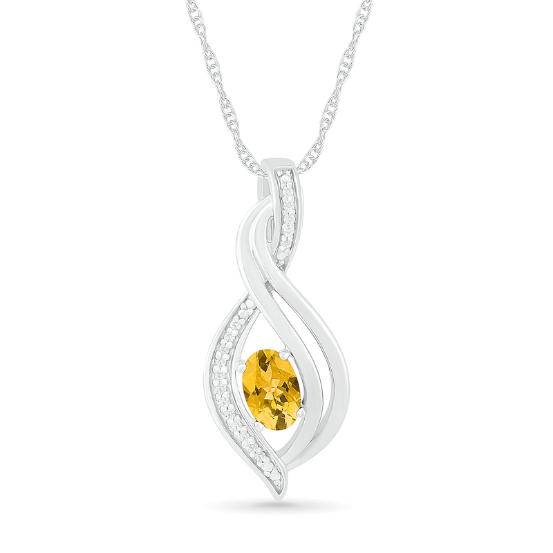 Oval Citrine and 0.04 CT. T.W. Diamond Flame Drop Pendant in Sterling Silver