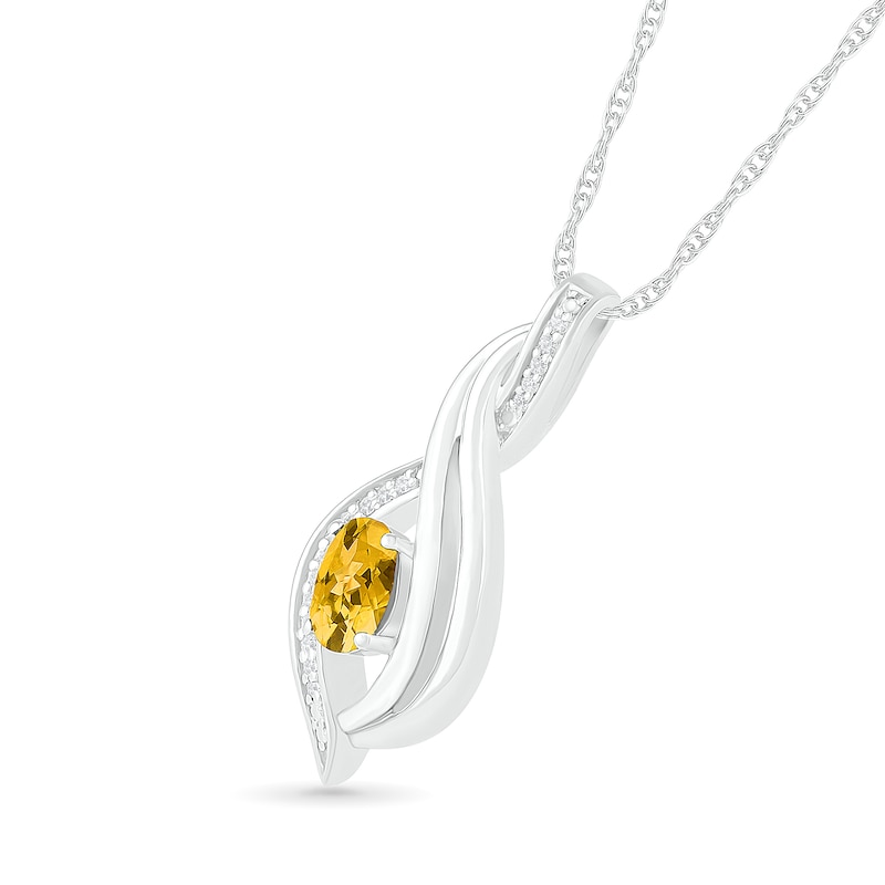 Main Image 2 of Oval Citrine and 0.04 CT. T.W. Diamond Flame Drop Pendant in Sterling Silver