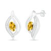 Thumbnail Image 1 of Oval Citrine and 0.04 CT. T.W. Diamond Bypass Flame Stud Earrings in Sterling Silver
