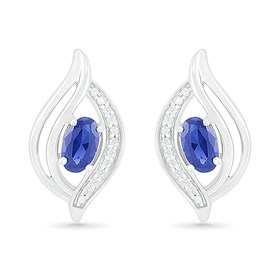 Oval Blue Lab-Created Sapphire and 0.04 CT. T.W. Diamond Bypass Flame Stud Earrings in Sterling Silver