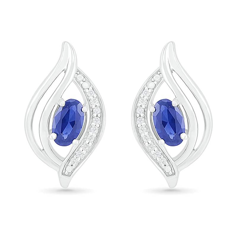 Oval Blue Lab-Created Sapphire and 0.04 CT. T.W. Diamond Bypass Flame Stud Earrings in Sterling Silver
