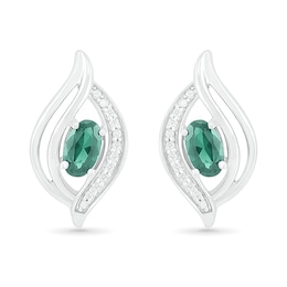 Oval Lab-Created Emerald and 0.04 CT. T.W. Diamond Bypass Flame Stud Earrings in Sterling Silver