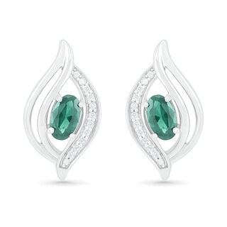 Oval Lab-Created Emerald and 0.04 CT. T.W. Diamond Bypass Flame Stud Earrings in Sterling Silver