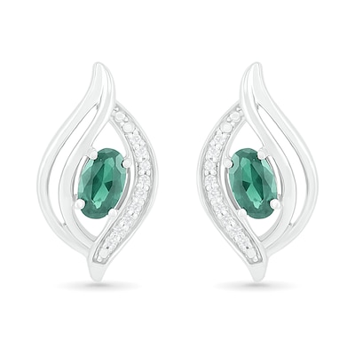 Oval Lab-Created Emerald and 0.04 CT. T.W. Diamond Bypass Flame Stud Earrings in Sterling Silver