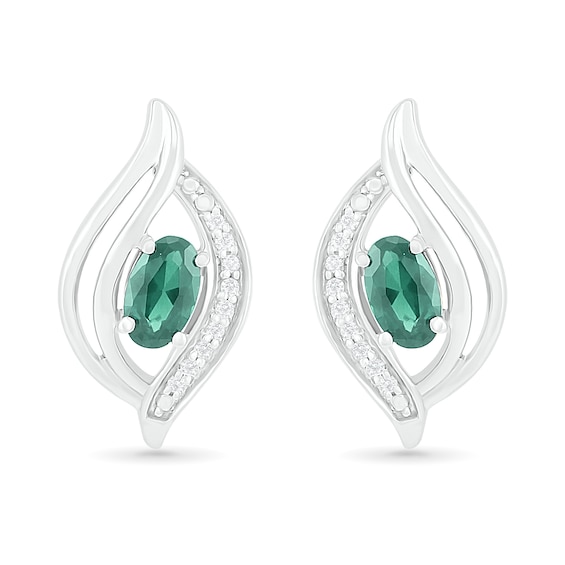 Oval Lab-Created Emerald and 0.04 CT. T.W. Diamond Bypass Flame Stud Earrings in Sterling Silver
