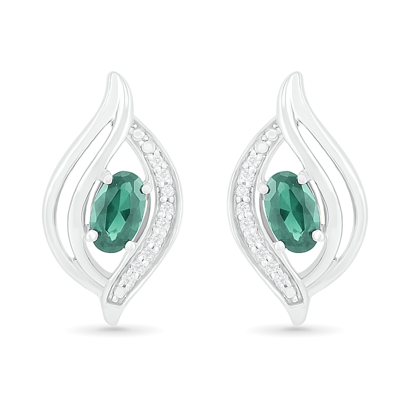 Oval Lab-Created Emerald and 0.04 CT. T.W. Diamond Bypass Flame Stud Earrings in Sterling Silver