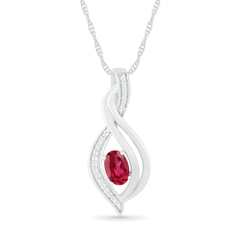 Oval Lab-Created Ruby and 0.04 CT. T.W. Diamond Flame Drop Pendant in Sterling Silver