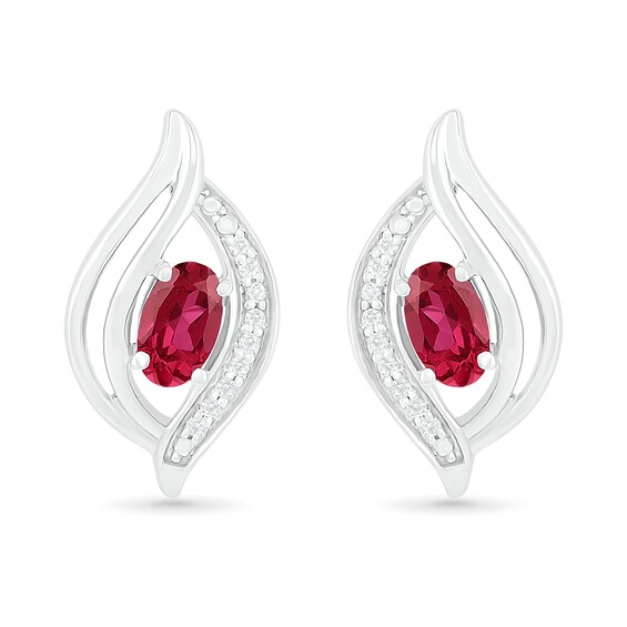 Oval Lab-Created Ruby and 0.04 CT. T.W. Diamond Bypass Flame Stud Earrings in Sterling Silver