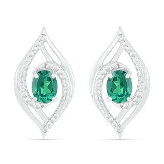 Lab-Created Oval Emerald and 0.067 CT. T.W. Diamond Bypass Flame Stud Earrings in Sterling Silver