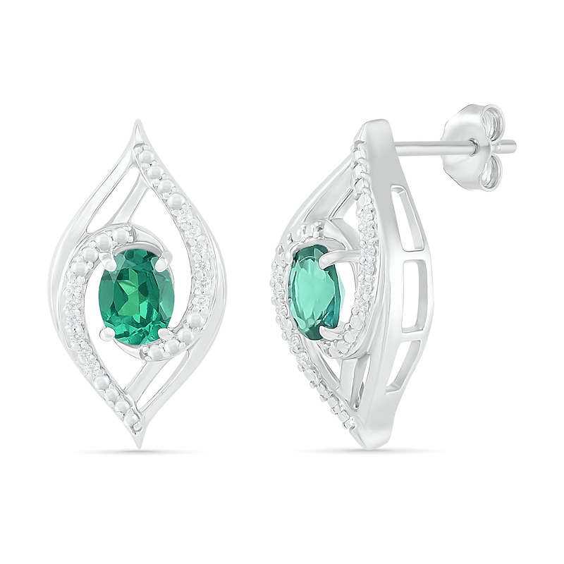 Main Image 2 of Lab-Created Oval Emerald and 0.067 CT. T.W. Diamond Bypass Flame Stud Earrings in Sterling Silver