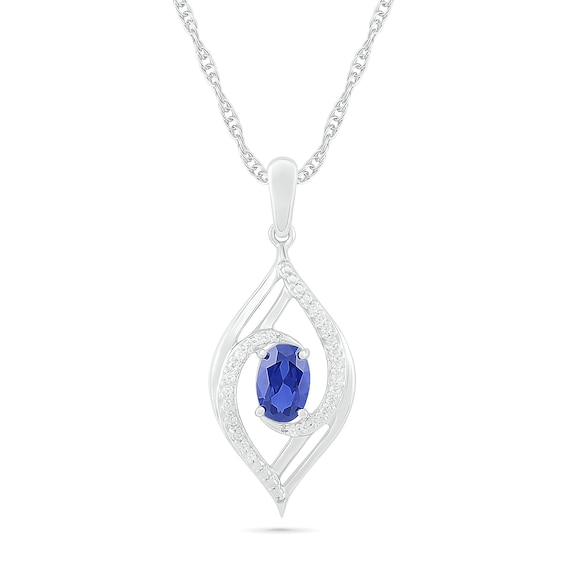 Oval Blue Lab-Created Sapphire and 0.065 CT. T.W. Diamond Bypass Flame Pendant in Sterling Silver