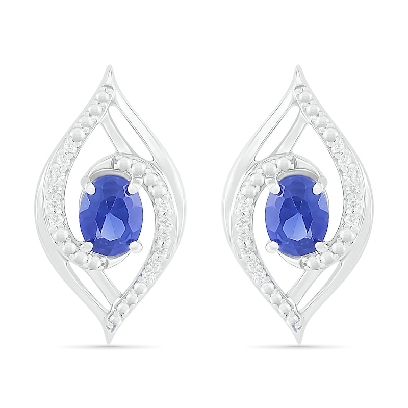 Oval Blue Lab-Created Sapphire and 0.067 CT. T.W. Diamond Bypass Flame Stud Earrings in Sterling Silver