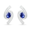 Oval Blue Lab-Created Sapphire and 0.04 CT. T.W. Diamond Bypass Ribbon Stud Earrings in Sterling Silver