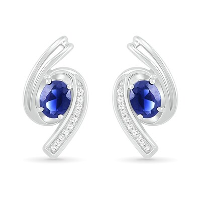 Oval Blue Lab-Created Sapphire and 0.04 CT. T.W. Diamond Bypass Ribbon Stud Earrings in Sterling Silver