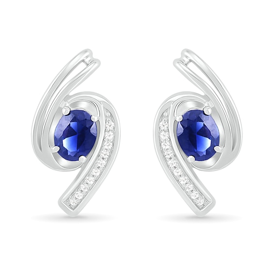 Oval Blue Lab-Created Sapphire and 0.04 CT. T.W. Diamond Bypass Ribbon Stud Earrings in Sterling Silver