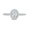 0.88 CT. T.W. Oval Diamond Frame Engagement Ring in 14K White Gold
