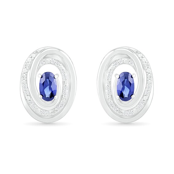 Oval Lab-Created Sapphire and 0.066 CT. T.W. Diamond Beaded Open Swirl Frame Stud Earrings in Sterling Silver