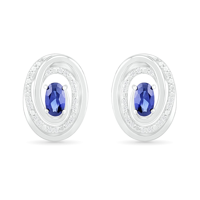 Oval Blue Lab-Created Sapphire and 0.066 CT. T.W. Diamond Beaded Open Swirl Frame Stud Earrings in Sterling Silver