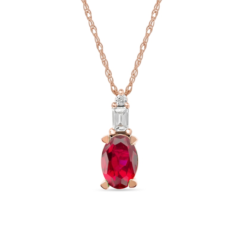 Oval Ruby and 0.05 CT. T.W. Baguette and Round Diamond Stacked Top Accent Pendant in 10K Rose Gold