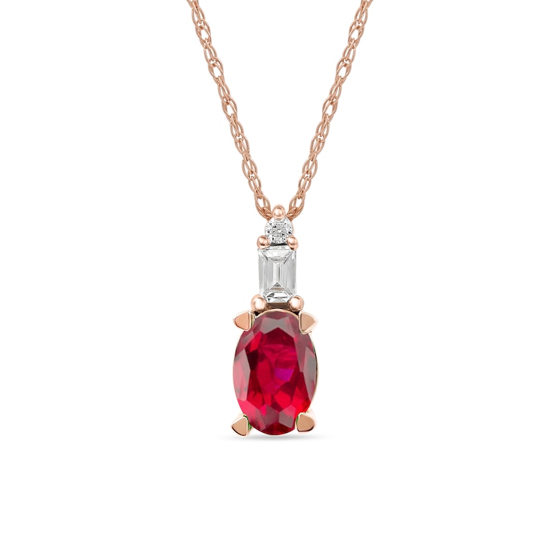 Oval Ruby and 0.05 CT. T.W. Baguette and Round Diamond Stacked Top Accent Pendant in 10K Rose Gold|Peoples Jewellers