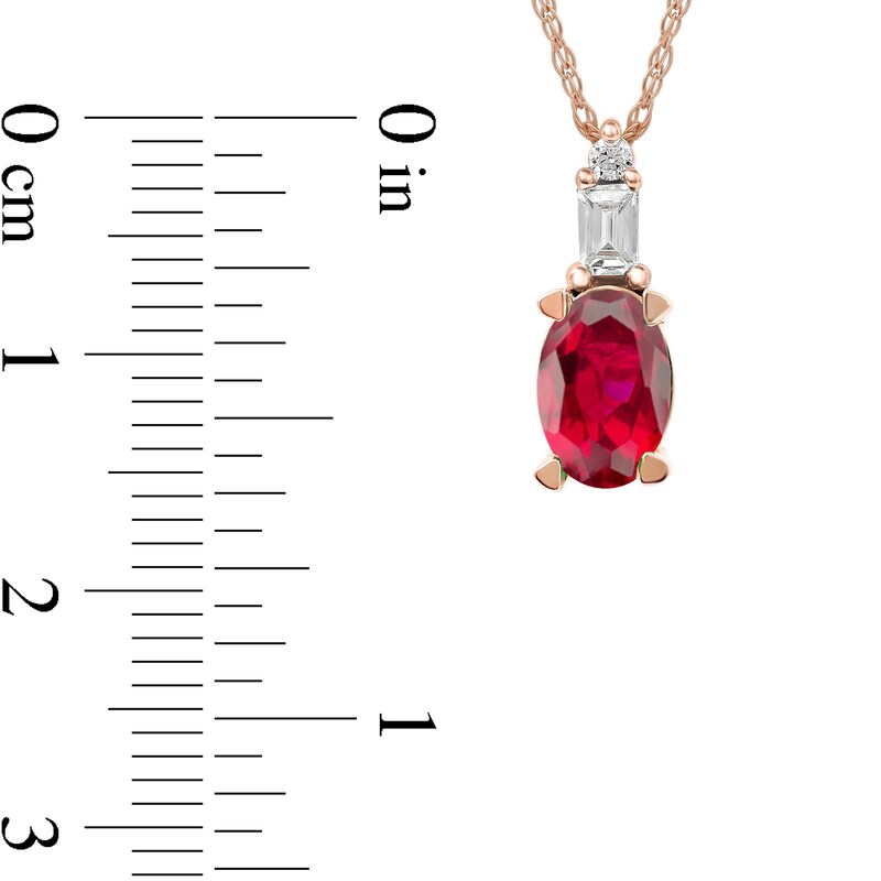 Oval Ruby and 0.05 CT. T.W. Baguette and Round Diamond Stacked Top Accent Pendant in 10K Rose Gold