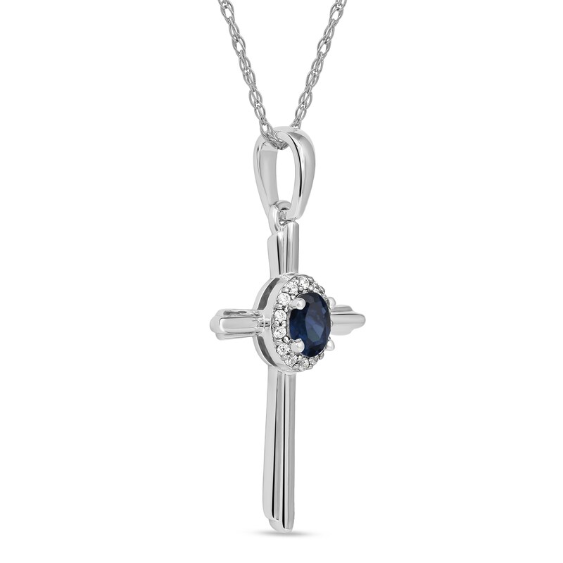 Oval Blue Sapphire and 0.04 CT. T.W. Diamond Frame Layered Cross Pendant in 10K White Gold|Peoples Jewellers