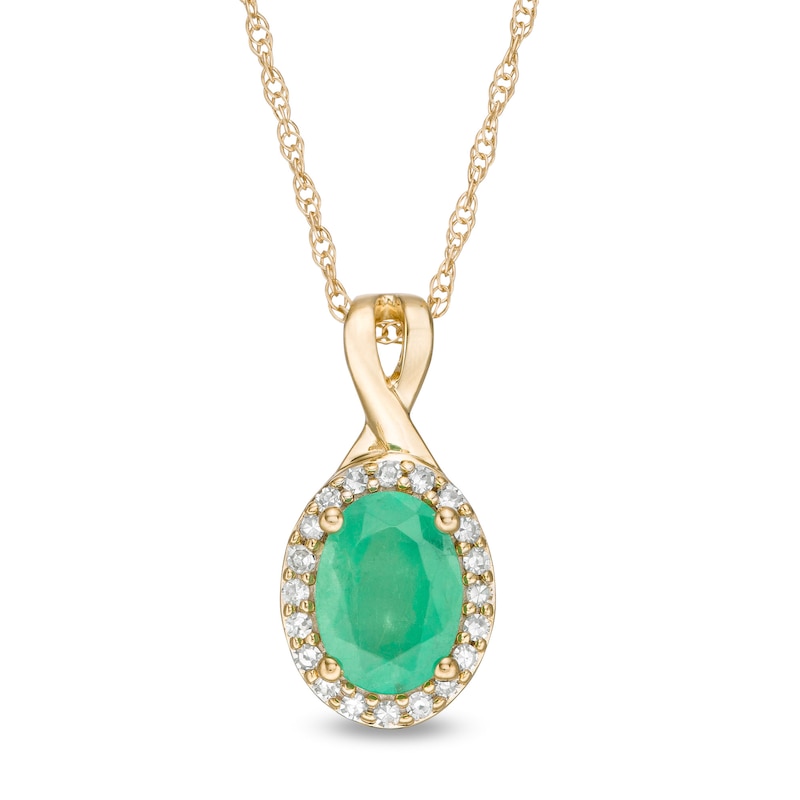 Main Image 1 of Oval Emerald and 0.08 CT. T.W. Diamond Frame Twist Drop Pendant in 10K Gold