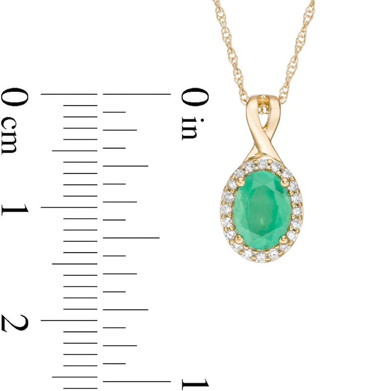 Main Image 3 of Oval Emerald and 0.08 CT. T.W. Diamond Frame Twist Drop Pendant in 10K Gold