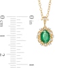 Thumbnail Image 3 of Oval Emerald and 0.05 CT. T.W. Diamond Scallop Frame Floral Drop Pendant in 10K Gold